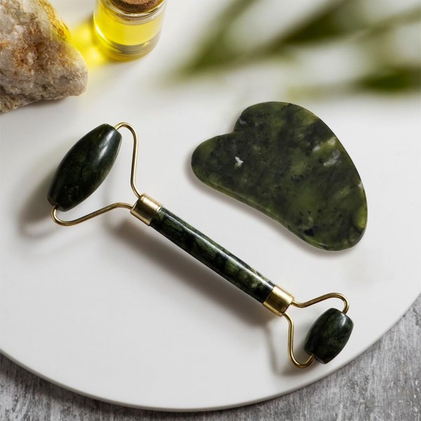 gua sha لعلاج الانتفاخ وشد الوجه